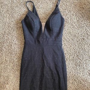 Black glitter gown with low cut mesh detail